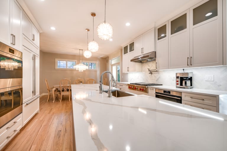 contemporary bright kitchen remodel and island countertop with golden veining