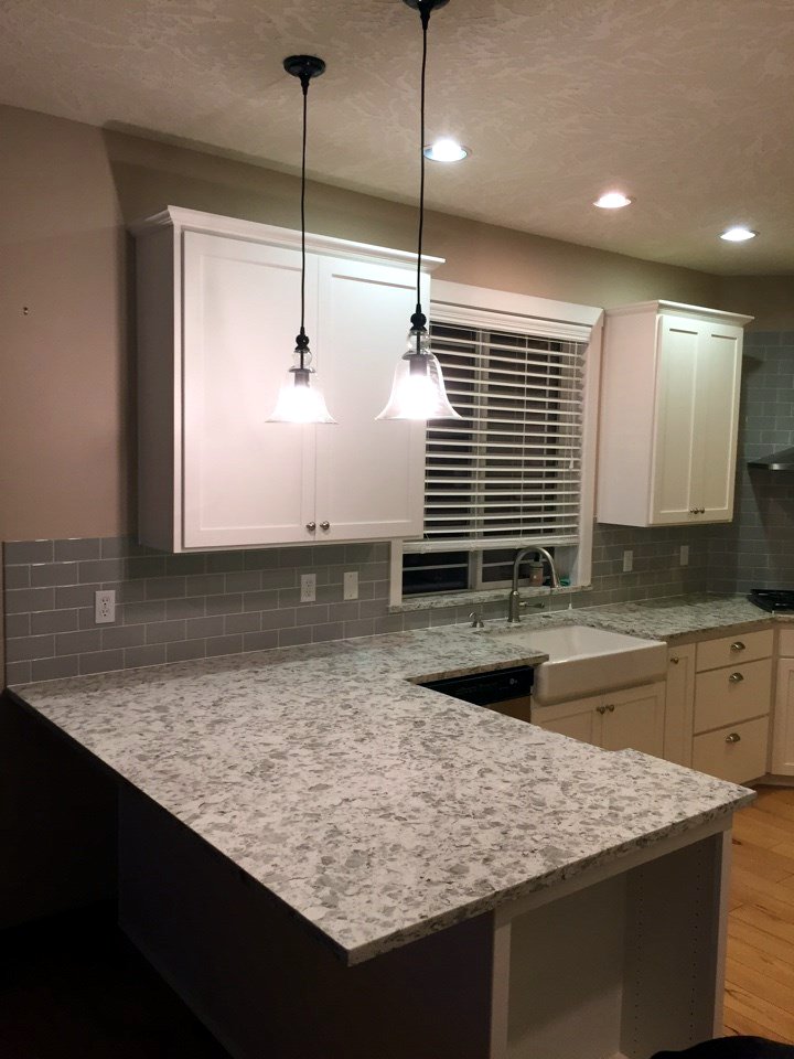 refaced cabinets and new quartz countertops