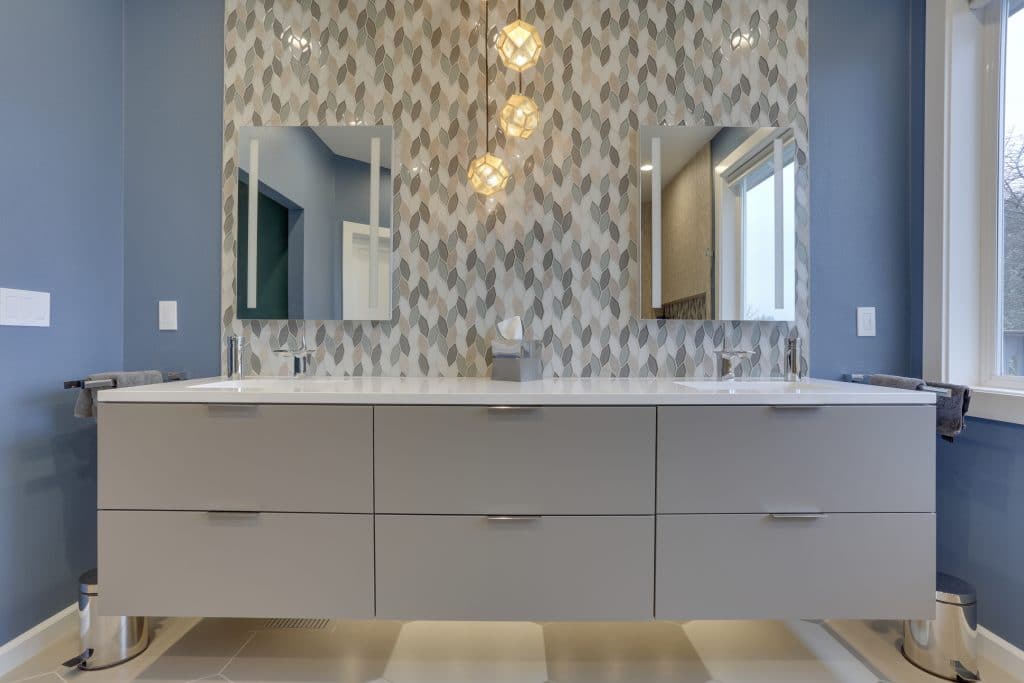 modern bathroom vanity with mosaic backsplash tile